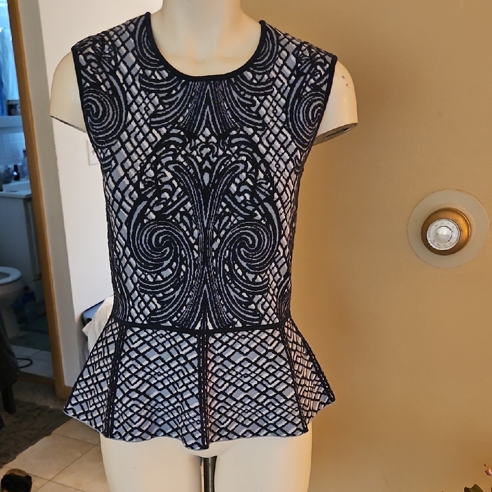 Beautiful BCBGMaxAzria Navy and White Sleeveless Peplum Knit Top
